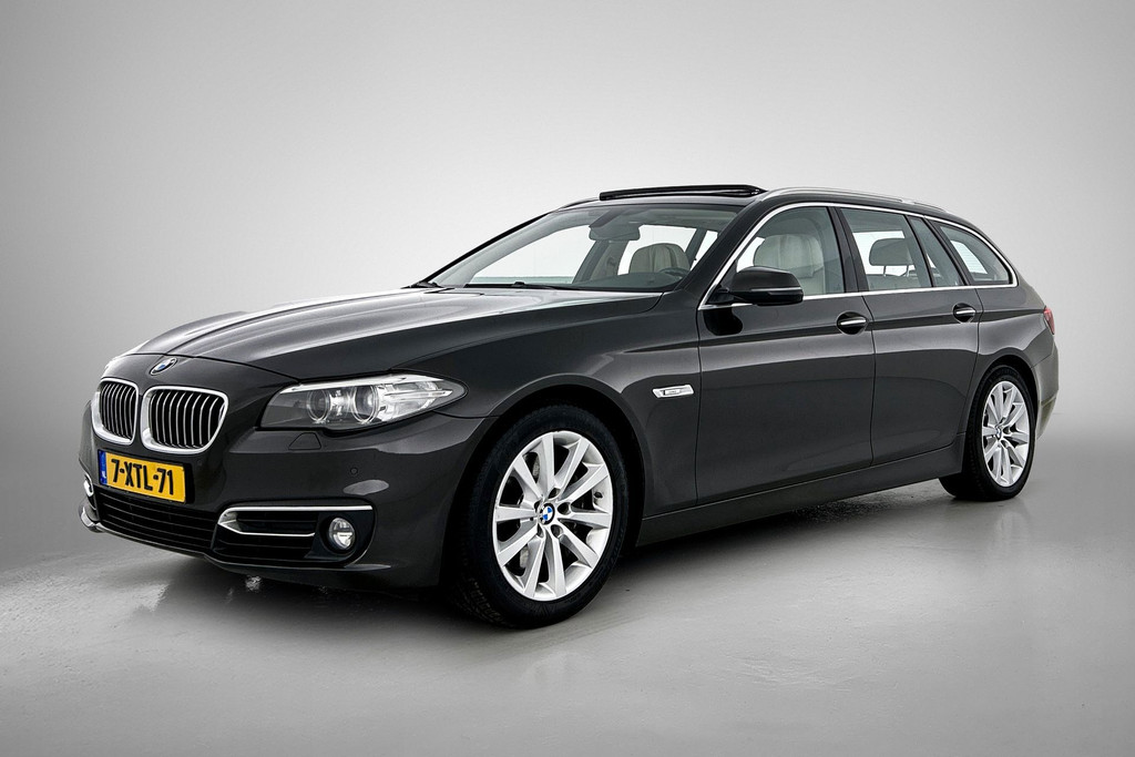 BMW 5 Serie Touring 528i High Executive(NL-auto, Panoramadak, Camera, StoelV, Comfort stoelen, Navi Pro, PDC V+A, Etc) 46825780-0.jpg | Autocentrum Brabant Breda