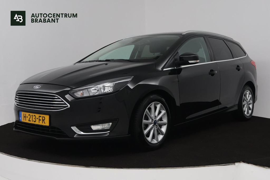 Ford FOCUS Wagon 1.0 Titanium (NAVIGATIE, STOELVERWARMING, STUURVERWARMING, PARKEERSENSOREN) 47900035-0.jpg | Autocentrum Brabant Breda