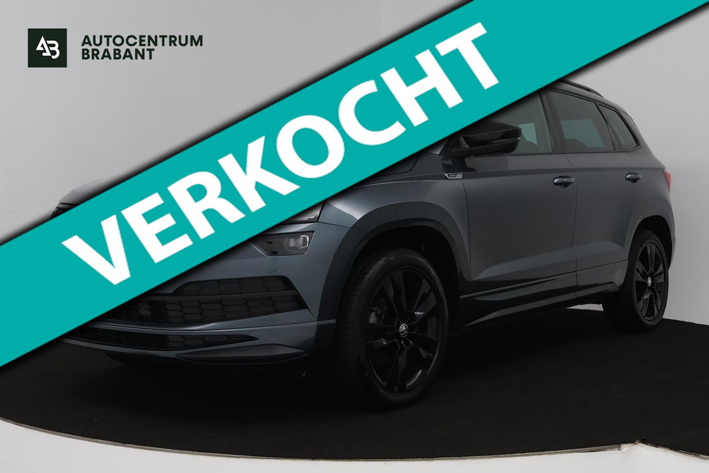 Škoda Karoq 1.5 TSI ACT Sportline Business (DIGITALE COCKPIT, STOEL/STUUR VERWARMING, TREKHAAK, SFEERVERLICHTING, CAMERA) 48037060-0.jpg | Autocentrum Brabant Breda