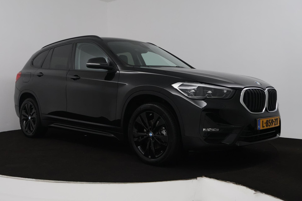 BMW X1 SDrive18i Business Edition (NAVIGATIE, STOELVERWARMING, HEAD-UP, SFEEVERLICHTING, 1e EIGENAAR, DEALER ONDERHOUDEN) 48568073-21.jpg | Autocentrum Brabant Breda