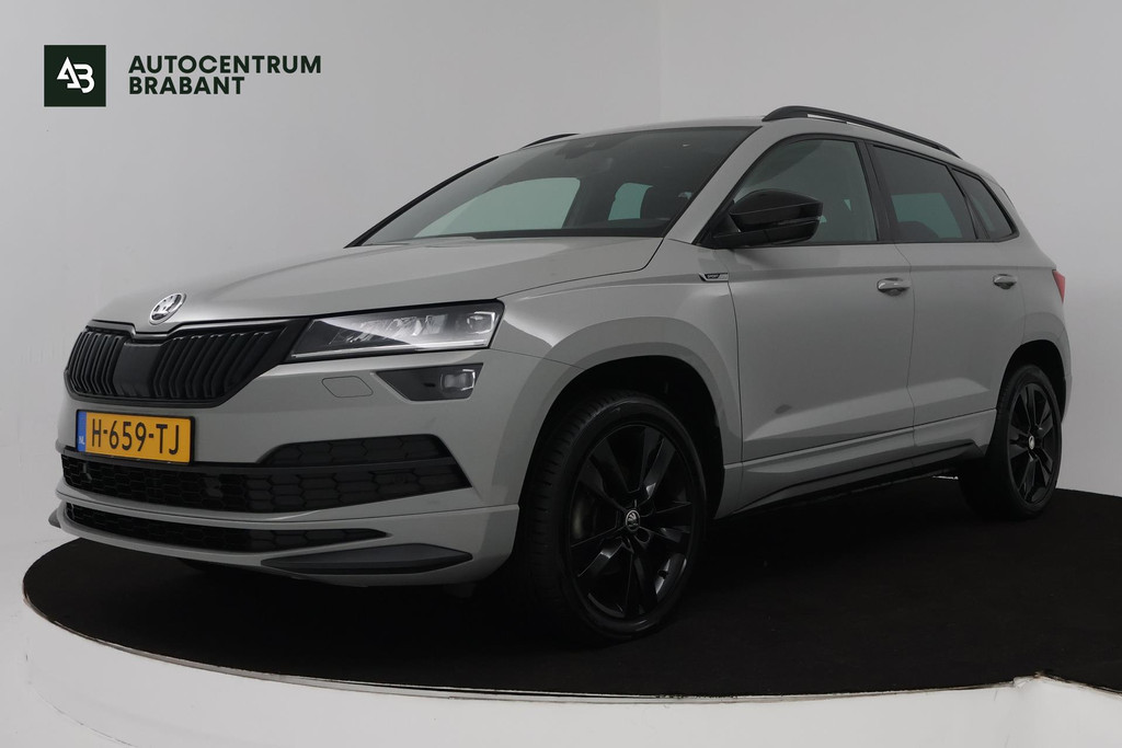 Škoda Karoq 1.5 TSI ACT Sportline Business (PANORAMADAK, DIGITALE COCKPIT, ACHTERUITRIJCAMERA, STOELVERWARMING, CRUISE ADAPTIEF) 48900702-0.jpg | Autocentrum Brabant Breda
