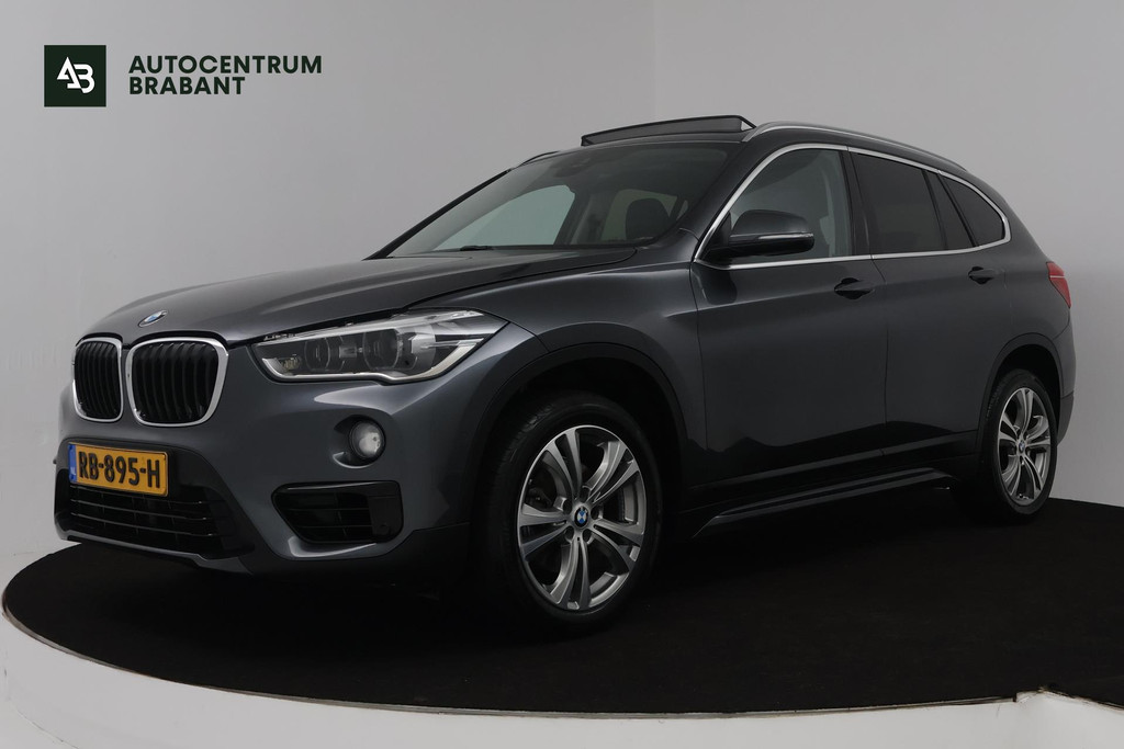 BMW X1 SDrive18i High Executive (PANORAMADAK, TREKHAAK AFNEEMBAAR, STOELVERWARMING, PARKEERSENSOREN, DEALER ONDERHOUDEN) 49378042-0.jpg | Autocentrum Brabant Breda