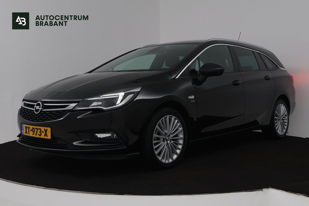 Opel Astra Sports Tourer 1.4 Turbo 120 Jaar Edition (TREKHAAK, PARKEERSENSOREN, CRUISE CONTROL, NAVIGATIE) 50798196-0.jpg | Autocentrum Brabant Breda