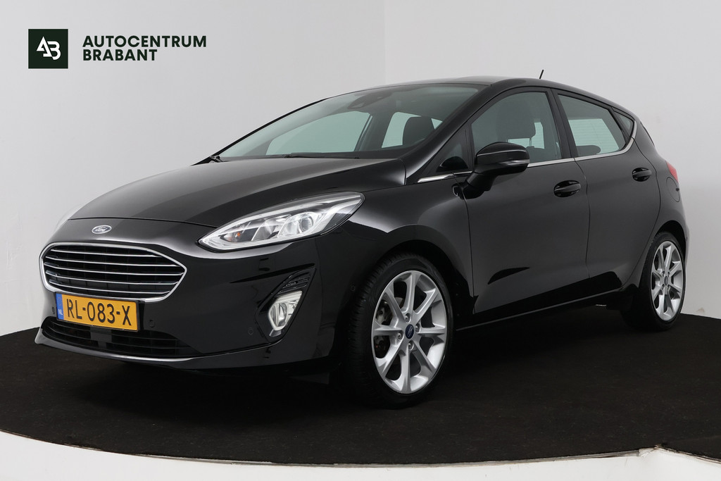 Ford Fiesta 1.0 EcoBoost Titanium (ACHTERUITRIJCAMERA, CRUISE CONTROL ADAPTIEF, NAVIGATIE, PARKEERSENSOREN) 52828585-0.jpg | Autocentrum Brabant Breda