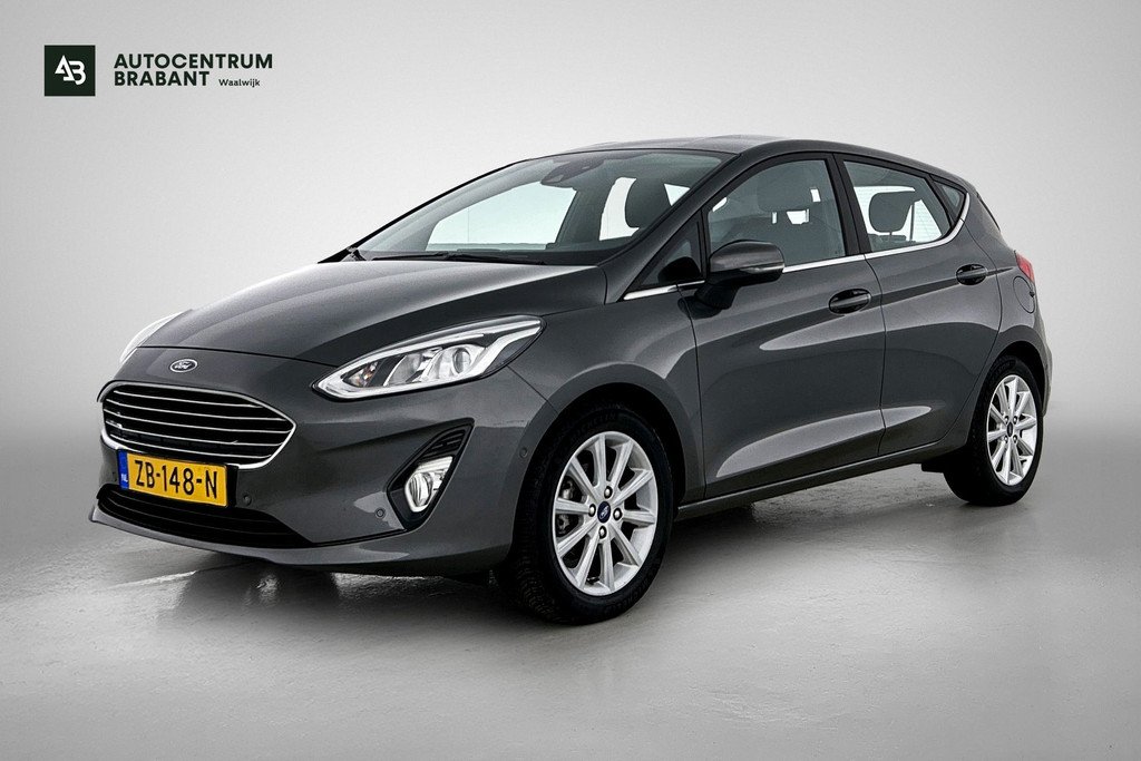 Ford Fiesta 1.0 EcoBoost Titanium (NAVIGATIE, CARPLAY, PARKEERSENSOREN, LED, STUURBEDIENING, 1e EIGENAAR, GOED ONDERHOUDEN) 53315123-0.jpg | Autocentrum Brabant Breda