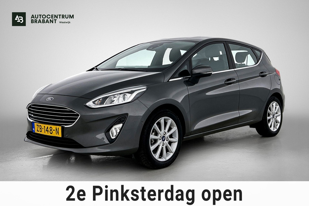 Ford Fiesta 1.0 EcoBoost Titanium (NAVIGATIE, CARPLAY, PARKEERSENSOREN, LED, STUURBEDIENING, 1e EIGENAAR, GOED ONDERHOUDEN) 53315123-0.jpg | Autocentrum Brabant Breda