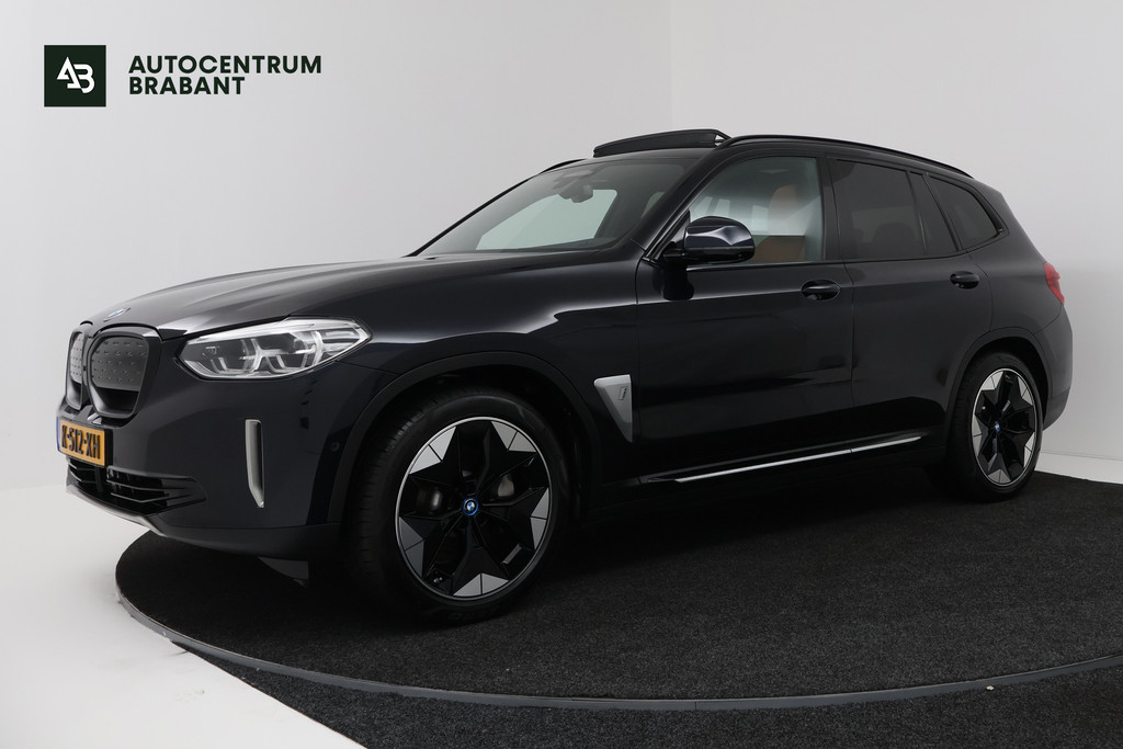 BMW iX3 High Executive 80 kWh (PANORAMADAK, 360 CAMERA, SFEERVERLICHTING, ADAPTIVE CRUISE, TREKHAAK WEGKLAPBAAR, AUTOPILOT) 53592088-0.jpg | Autocentrum Brabant Breda