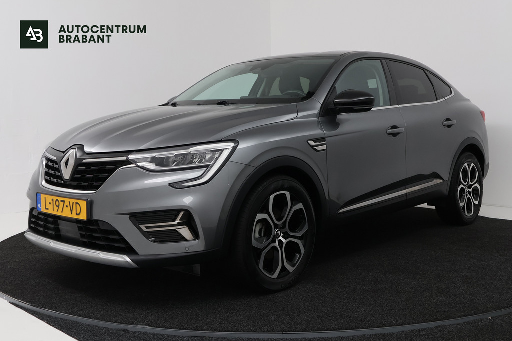 Renault Arkana 1.6 E-Tech Hybrid 145 Intens (SFEERVERLICHTING, CRUISE ADAPTIEF, ACHTERUITRIJCAMERA, PARKEERSENSOREN) 54204473-0.jpg | Autocentrum Brabant Breda