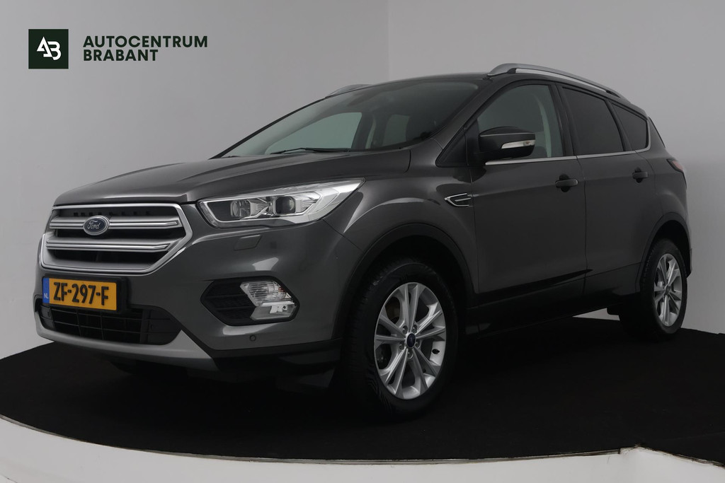 Ford Kuga 1.5 EcoBoost Titanium (TREKHAAK, STOEL/STUUR VERWARMING, NAVIGATIE, PARKEERSENSOREN) 54637646-0.jpg | Autocentrum Brabant Breda