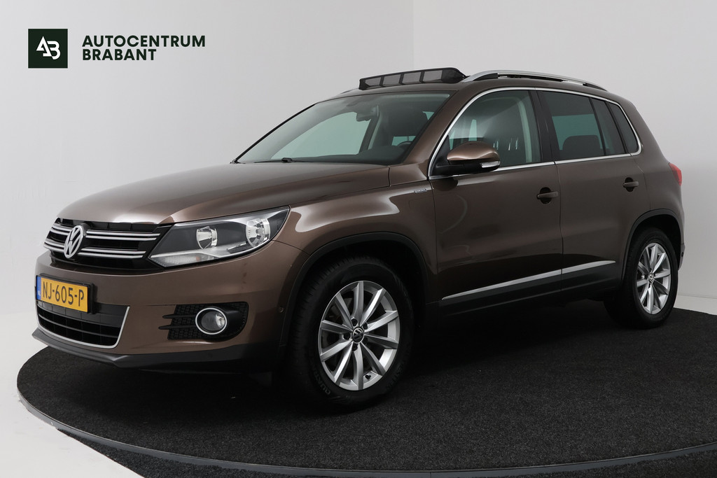 Volkswagen Tiguan 1.4 TSI Sport Edition (PANORAMADAK, CAMERA, PARKEERHULP, STUURBEDIENING, MULTIMEDIA, PARKEERSENSOREN) 54740114-0.jpg | Autocentrum Brabant Breda