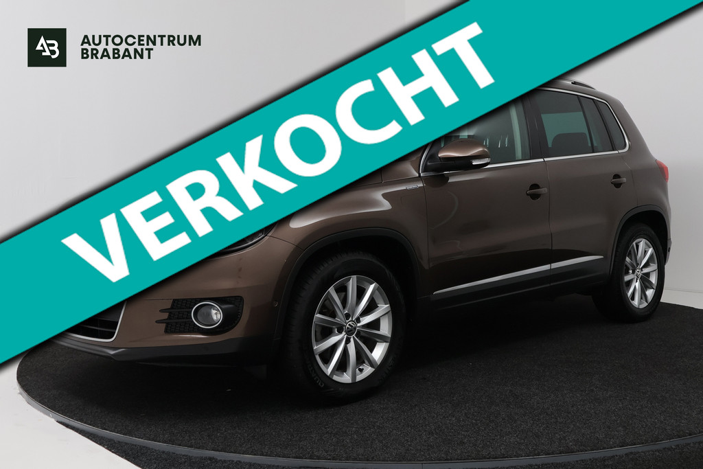 Volkswagen Tiguan 1.4 TSI Sport Edition (PANORAMADAK, CAMERA, PARKEERHULP, STUURBEDIENING, MULTIMEDIA, PARKEERSENSOREN) 54740114-0.jpg | Autocentrum Brabant Breda