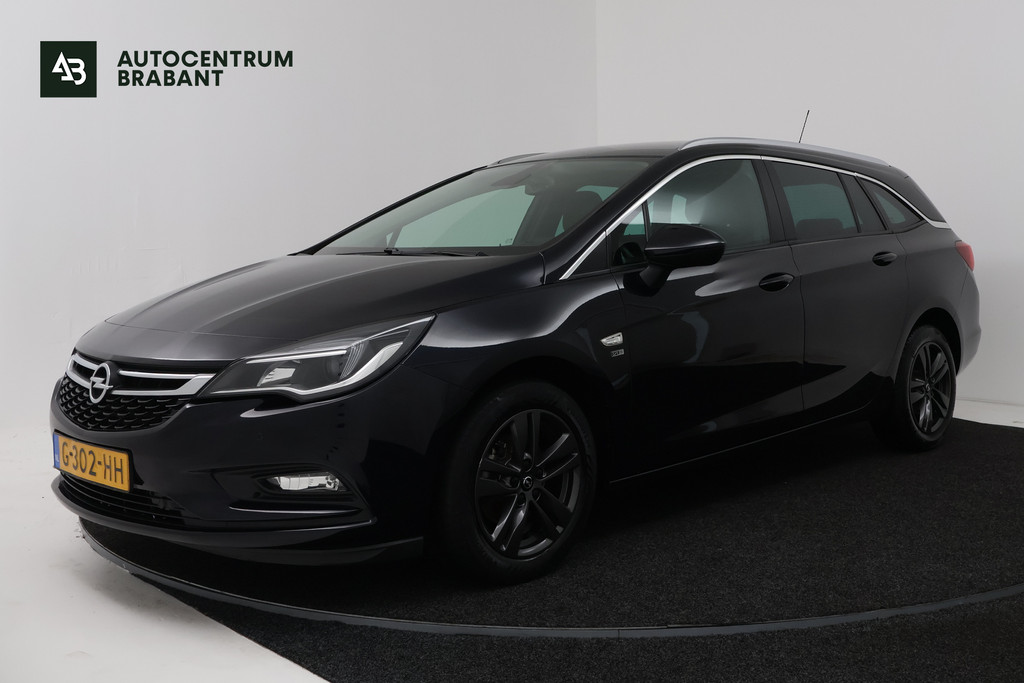 Opel Astra Sports Tourer 1.4 Turbo 120 Jaar Edition (NAVIGATIE, CRUISE CONTROL, PARKEERSENSOREN) 56613444-0.jpg | Autocentrum Brabant Breda
