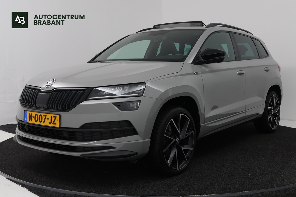 Škoda Karoq 1.5 TSI ACT Sportline Business (PANORAMADAK, TREKHAAK, STOEL/STUUR VERWARMING, CAMERA) 57372216-0.jpg | Autocentrum Brabant Breda