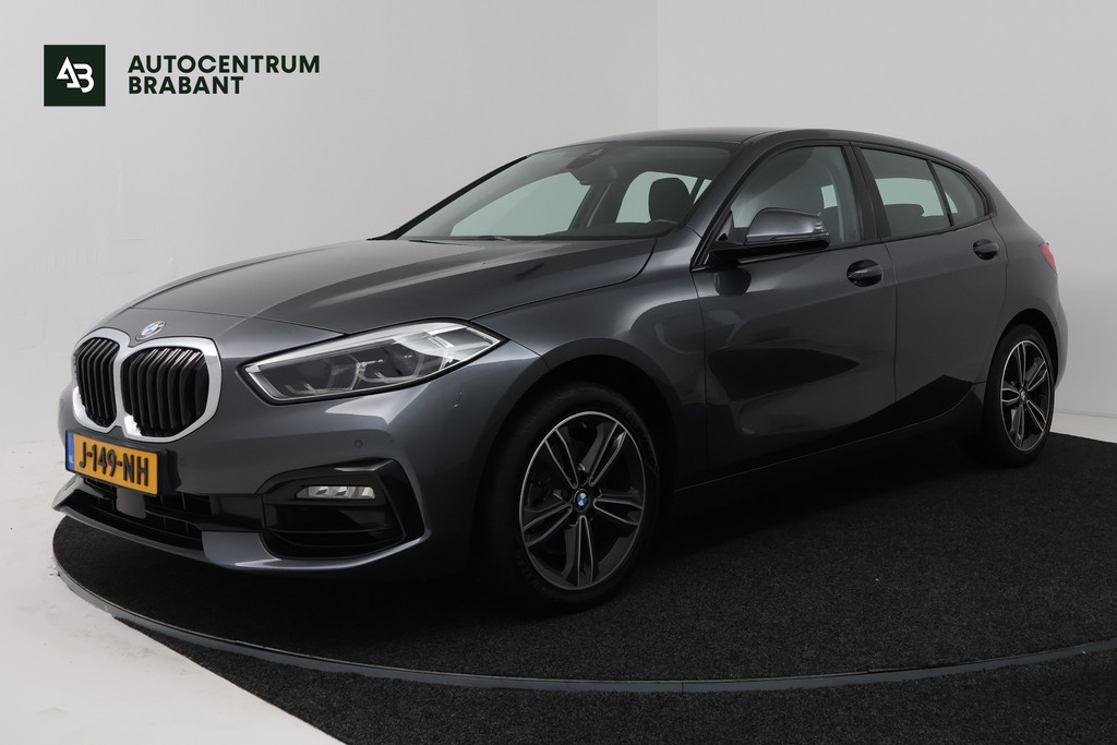 BMW 1 Serie 118i High Executive (STOELVERWARMING, SFEERVERLICHTING, NAVIGATIE, PARKEERSENSOREN) 57557349-0.jpg | Autocentrum Brabant Breda